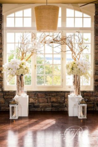White Birch Branched Wedding Arch – shared in a roundup post on Flirty Fleurs