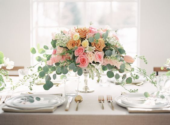 Blush, Peach, and Emerald Wedding Centerpiece – shared on Wedding Sparrow