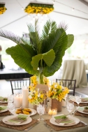 Tropical Tall Centerpiece with Palm Leaves with Yellow Flowers – shared by Elizabeth Anne