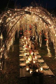Fairy Twinkle Light Arbor over Garden Estate Table shared on Bodas Y Weddings