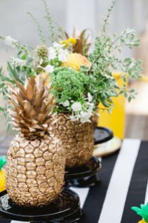 Golden Pineapple with Black and White Stripes Tablescape – shared by Better Homes and Gardens