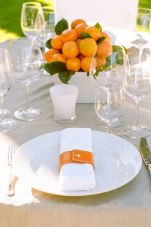 Modern Orange and White Tablescape with Orange Citrus Fruit