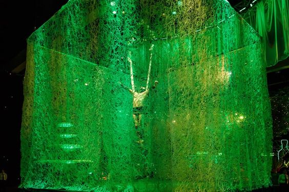 Green Draped and Illuminated Entertainment Cube – shared in a roundup post by BizBash